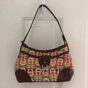 Small Etienne Aigner leather and cloth purse. Used but in like new condition.